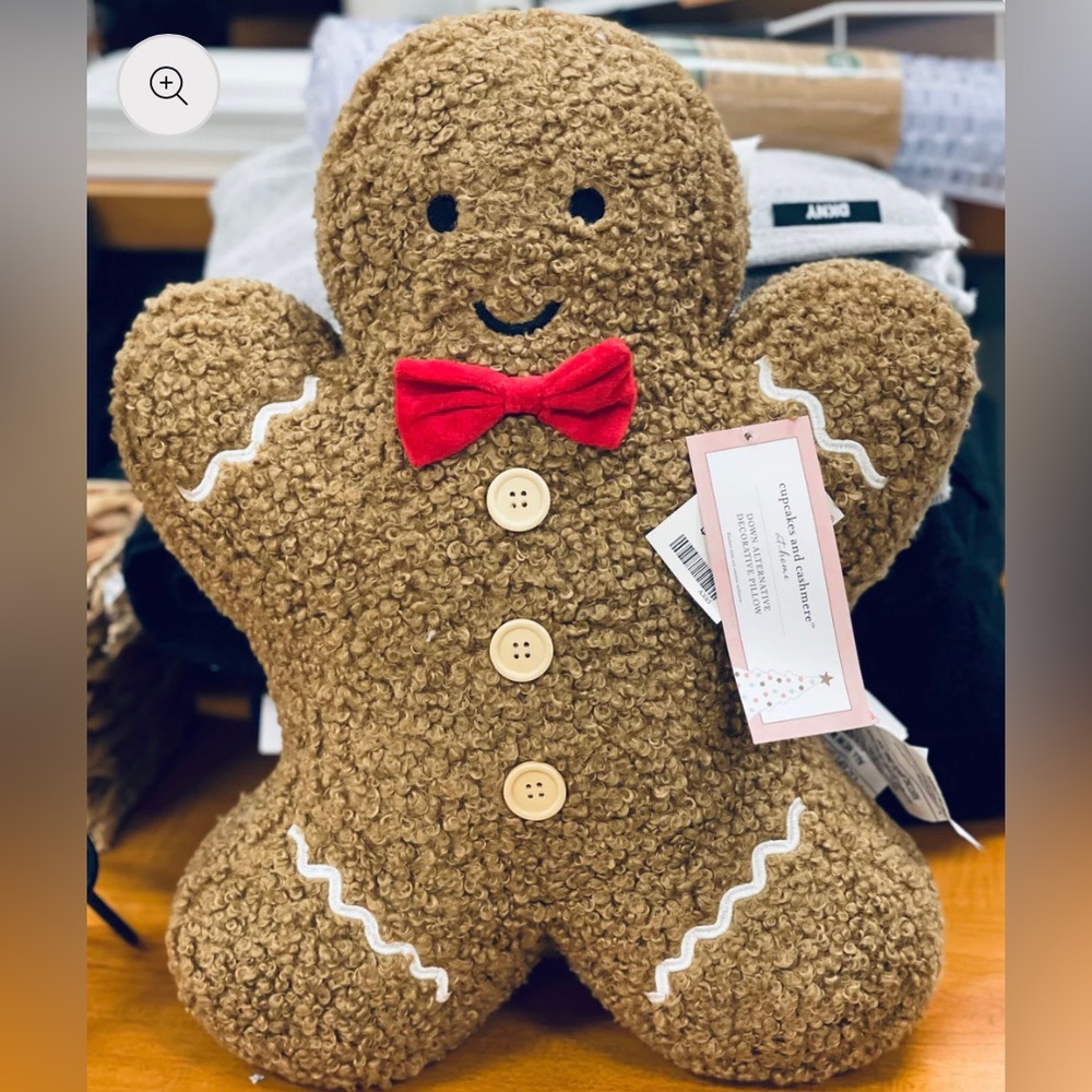 cupcakes & cashmere Gingerbread Plush Holiday Pillow in Brown with Red Bow
